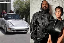 Bianca Censori uses phone while driving Porsche through Beverly Hills as Kanye West faces Maybach towing incident at Château Marmont