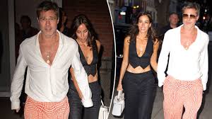 Brad Pitt embraces bold lavender fashion as he steps out hand-in-hand with Ines de Ramon for a stylish date night in New York City