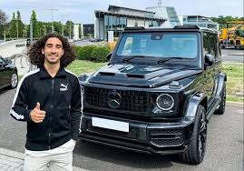 Chelsea star Marc Cucurella gets spotted using his phone while driving his £140k Mercedes G-Wagon through Surrey roads