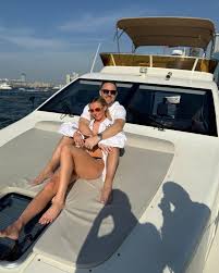 Chloe Kelly enjoys relaxing holiday in the sun with husband and England teammates ahead of European Championship in Germany