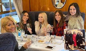 Holly Willoughby shares hilarious throwback with Christine Lampard as the pair enjoy crisp-filled girls’ night at home in London