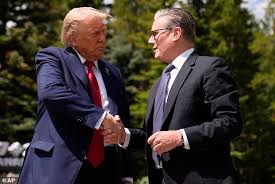 Donald Trump drops official trade deal papers as he joins Keir Starmer to announce new US-UK agreement at G7 summit