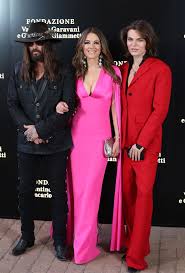 Elizabeth Hurley praises Damian and Miley Cyrus as she attends London film premiere with Billy Ray