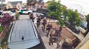 Federal agents blast open front door and terrify mother and children during pre-dawn immigration raid in Huntington Park