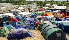 Fury as French police remove dozens of tents and sleeping bags while migrants sleep in Paris parks