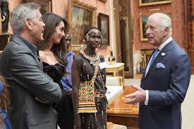 George and Amal Clooney charm King Charles during Buckingham Palace reception celebrating global youth awards