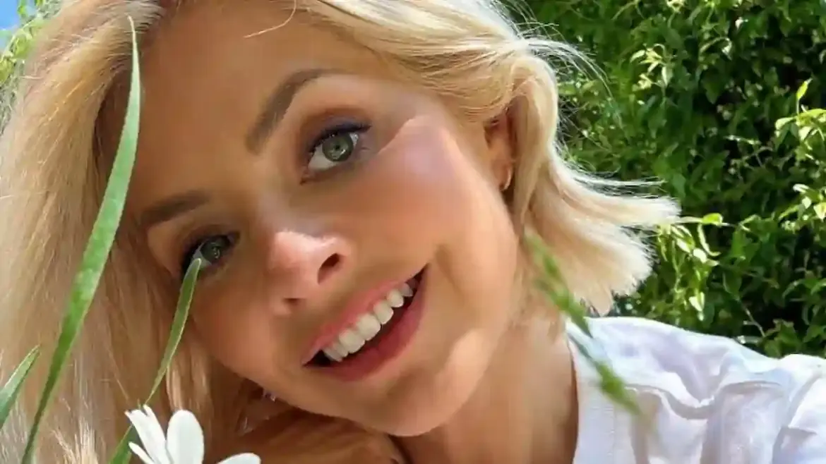 Holly Willoughby honors her dad with heartfelt jungle throwback while stars across the UK celebrate Father’s Day with emotional tributes