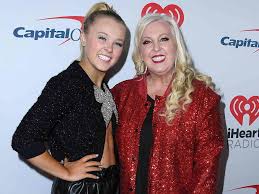 JoJo Siwa reflects on her childhood stardom and reclaims her identity while navigating life in California and London