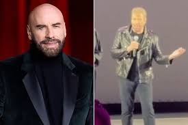 John Travolta surprises Grease fans by dressing