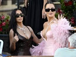 Kardashian sisters make early exit from Jeff Bezos’s
