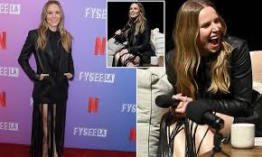 Kristen Bell jokes about not wearing pants while attending Netflix panel event with Adam Brody in Los Angeles
