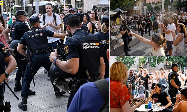 Angry protesters confront British holidaymakers as anti-tourism demonstrations spiral into chaos across Majorca and Ibiza