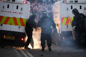 Masked rioters torch emergency shelter at Larne Leisure Centre in Northern Ireland as anti-immigrant violence escalates