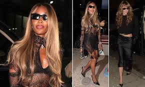 Naomi Campbell stuns in black lace dress while supporting Miley Cyrus at London album event and joins star for glamorous city night