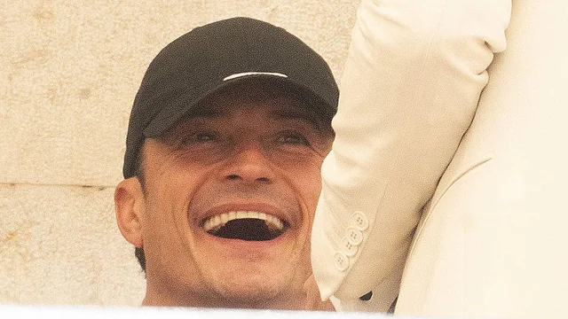 Orlando Bloom shares laughter with guests and embraces mystery brunette in Venice ahead of Jeff Bezos and Lauren Sanchez’s extravagant wedding