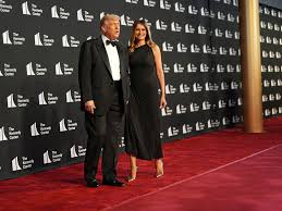 President Donald Trump shrugs off Les Misérables cast boycott as he arrives with Melania at the Kennedy Center in Washington DC