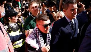 Rapper Mo Chara sparks massive protest as he appears at Westminster Magistrates Court over terrorism charge in London