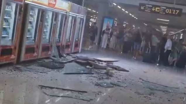 Ceiling collapse in arrivals hall sends debris crashing onto baggage claim area at busy Majorca international airport