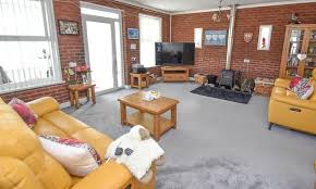 Spooky Halloween statue shocks house hunters as two bedroom Skegness bungalow lists with ghostly figure in the living room