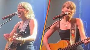 Taylor Swift surprises roaring crowd