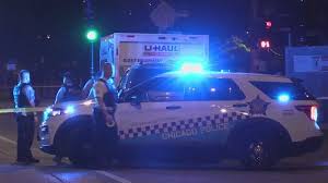 Three armed suspects open fire on group standing on sidewalk killing two people and injuring one man in Chicago’s Near West Side
