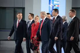 Trump signals desire to strike major political deal with Russia as he heads to NATO summit in Brussels