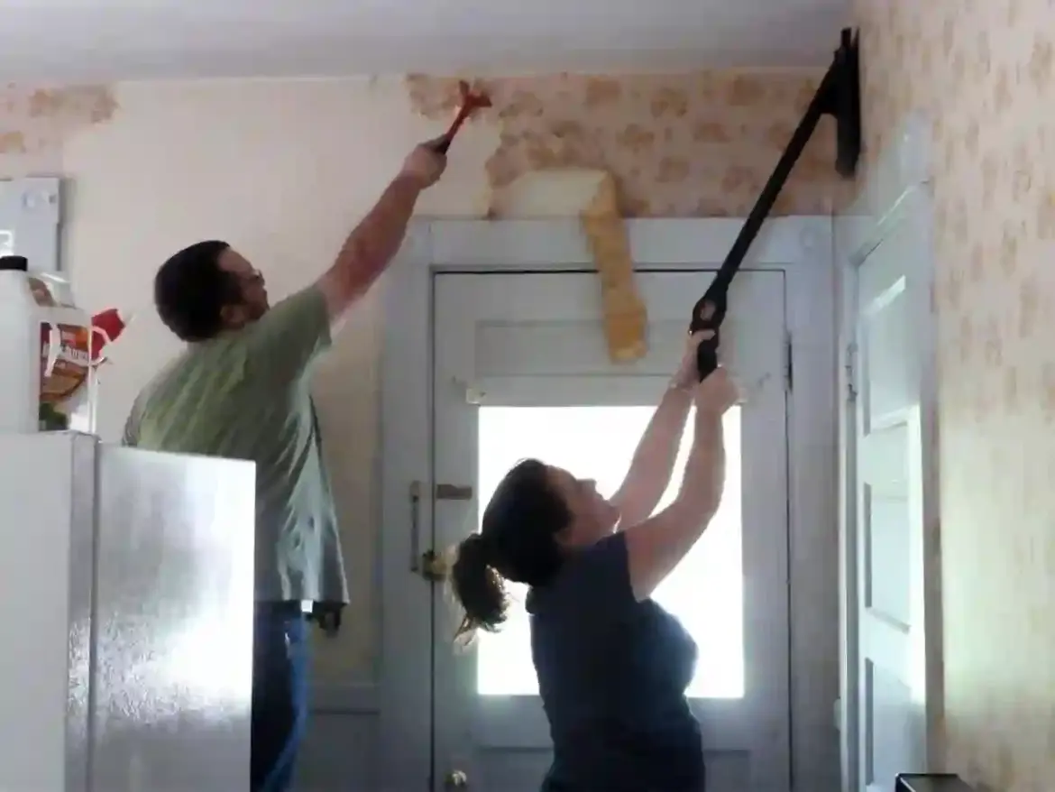 Home decor enthusiasts discover how to refresh rental walls on a shoestring budget with fabric, string lights, and zero damage in small living spaces