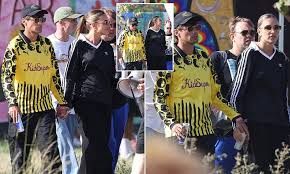 Zara McDermott hugs Louis Tomlinson’s sister Lottie during Glastonbury weekend as their relationship grows stronger in Somerset