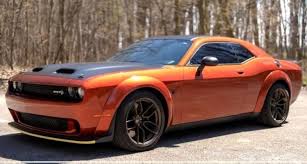 Srt Sani allegedly pulls trigger on longtime friend in orange Dodge Challenger near Chambers and West Florissant in St Louis