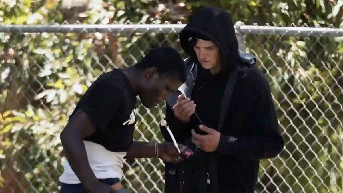 Federal immigration agents storm MacArthur Park in downtown Los Angeles as residents clash with officials over drug crime and homelessness crisis