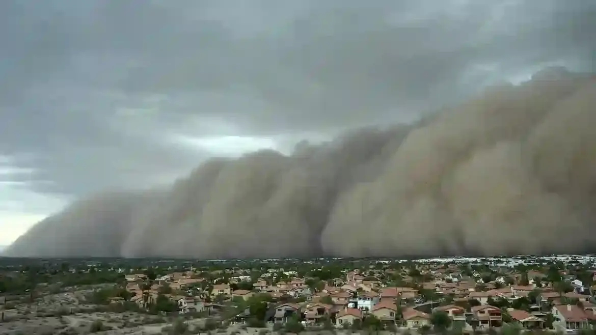 Massive wall of dust blankets Phoenix as powerful monsoon storm knocks out power and halts flights across Arizona