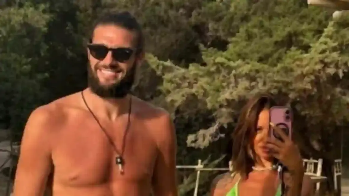 Andy Carroll surprises fans by traveling to Ibiza to reconcile with Lou Teasdale while his football club warns him to tone down their romance