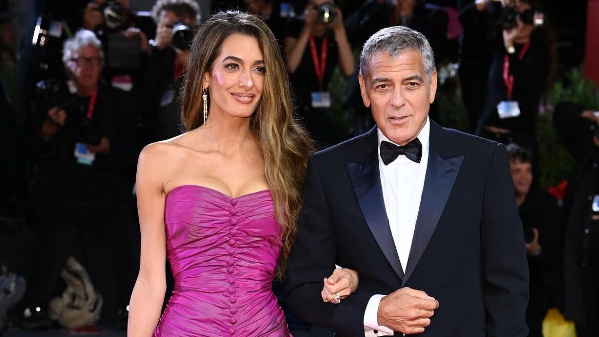 George Clooney walks the red carpet despite battling a sinus infection at the Venice Film Festival while promoting his Netflix film Jay Kelly