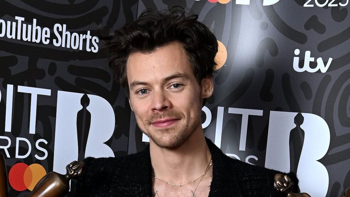 Harry Styles and Zoë Kravitz spark romance rumors as they are spotted kissing at a London restaurant before being seen arm in arm in Rome