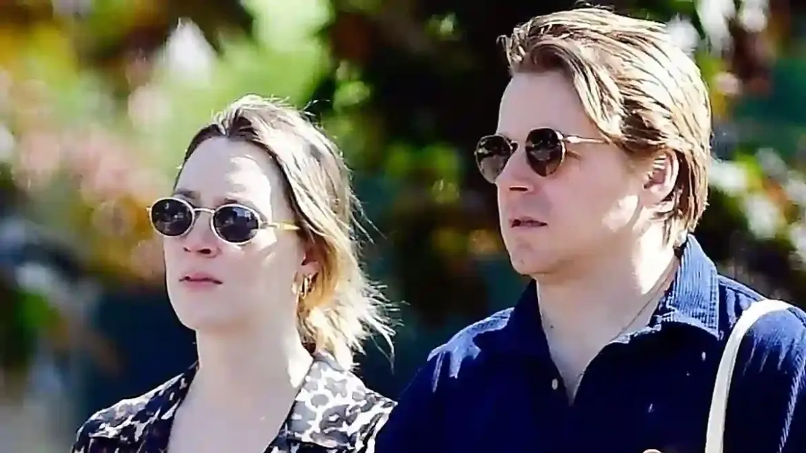 Saoirse Ronan enjoys sunny London dog walk with husband Jack Lowden while embracing pregnancy and maternity style