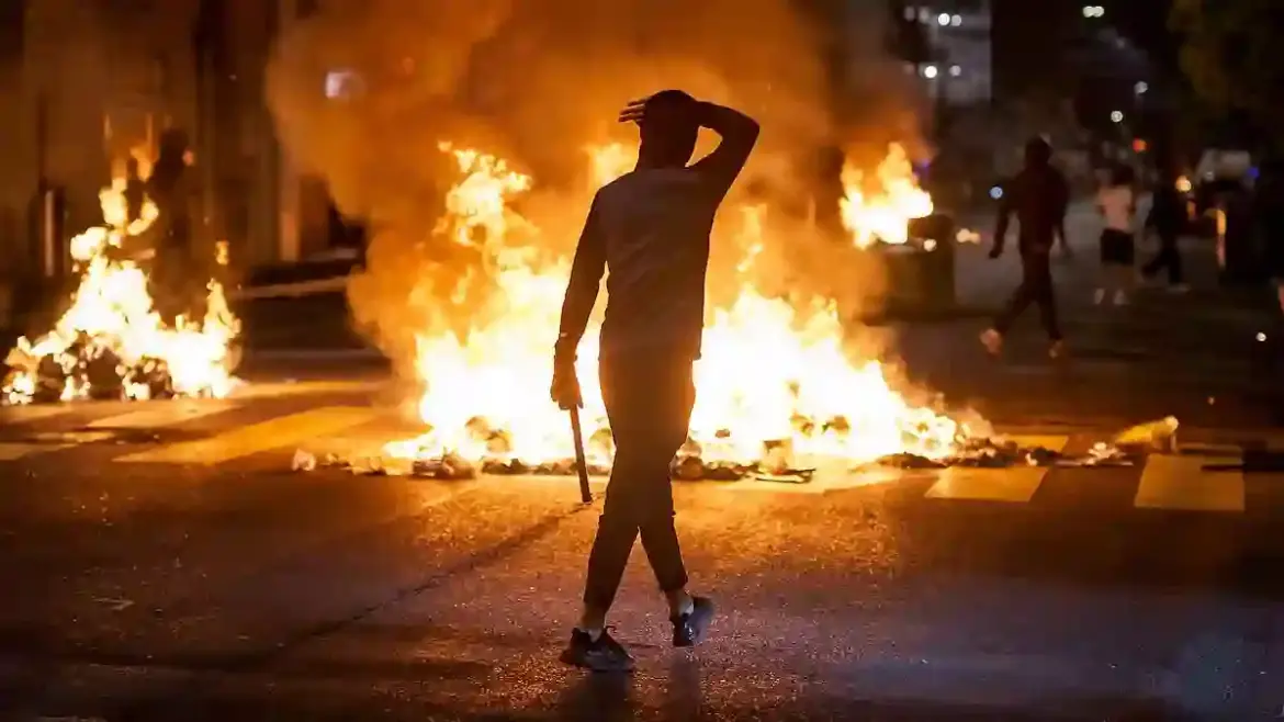 Switzerland braces for more violent riots as migrant youth clash with police in the streets of Lausanne