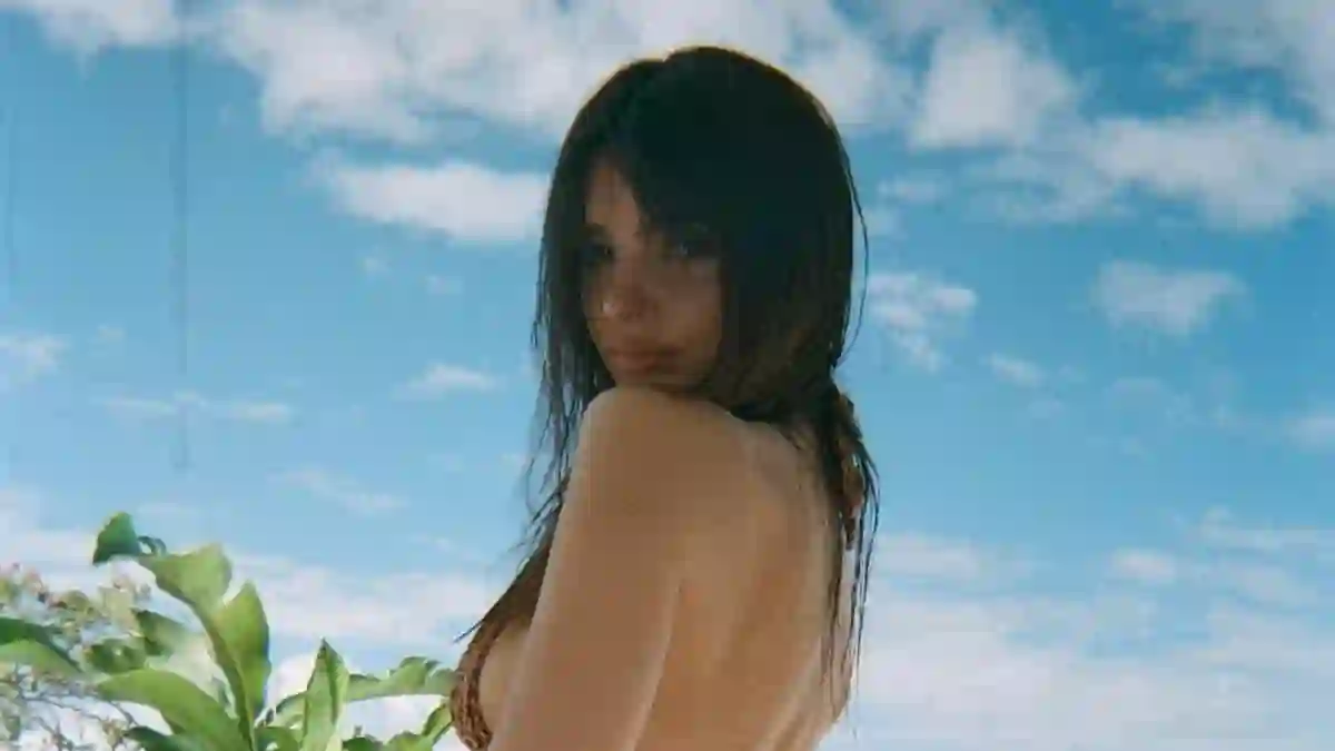 Kourtney Kardashian confirms romance with Travis Barker as she embraces thong bikini look on a sun-soaked holiday in Italy