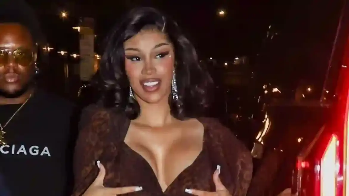 Cardi B stuns in a daring leopard print gown as she parties at Raising Cane’s bash in New York after the MTV VMAs