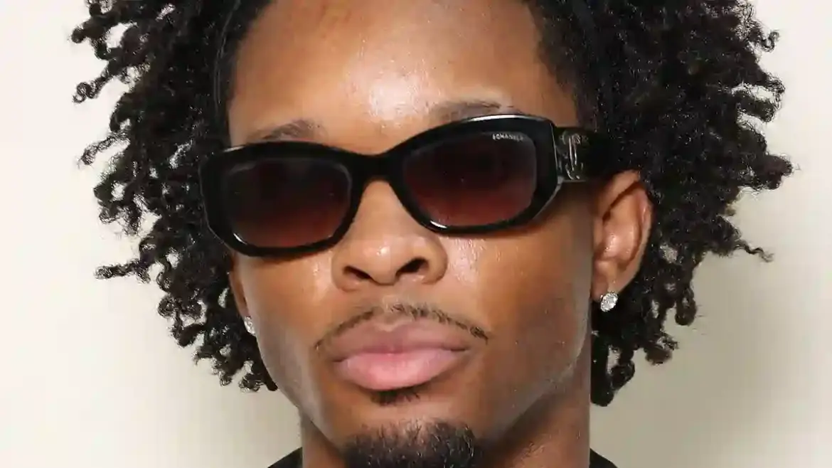 Police raid the Los Angeles home of singer D4vd after a Tesla linked to him was found with the body of a missing teenage girl inside
