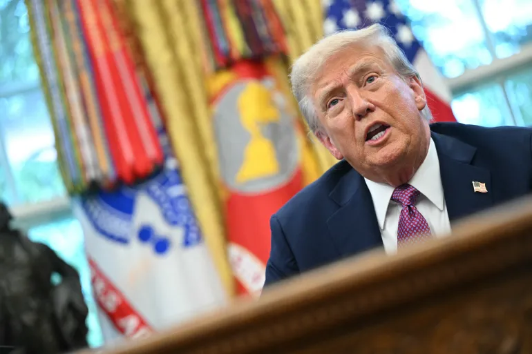 Trump threatens Chicago with a so called Chipocalypse as federal agents and military vehicles move into Illinois naval base ahead of planned ICE raids