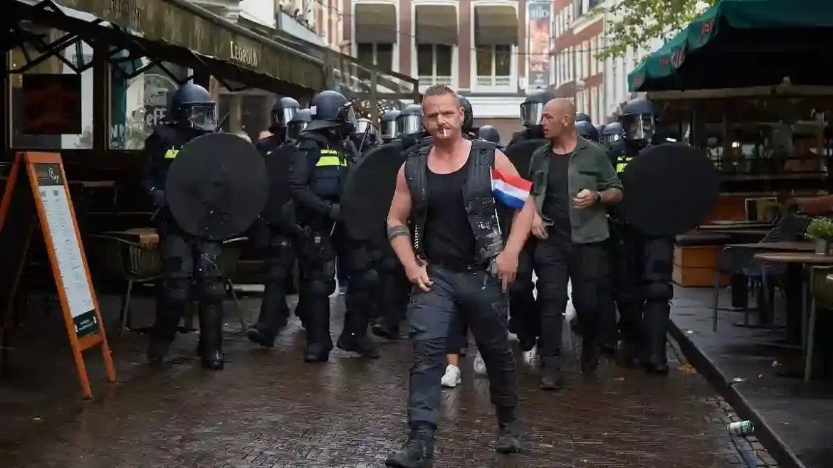 Dutch police use tear gas and water cannon as far right demonstration turns into riot in The Hague city center