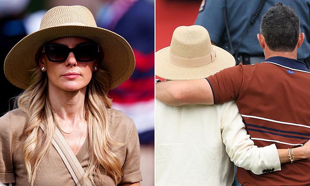 Rory McIlroy comforts wife Erica after abusive American fans throw drink and hurl insults at Ryder Cup in the United States