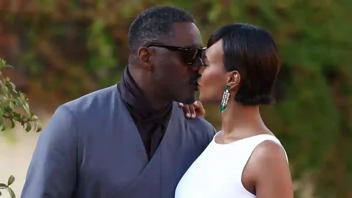 Idris Elba kisses wife Sabrina on the red carpet as couple share passionate moment at A House of Dynamite premiere in Venice