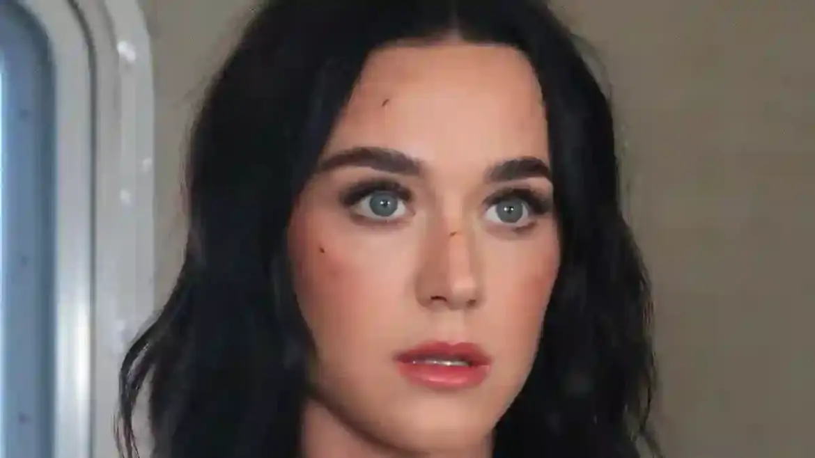 Katy Perry marks the one year anniversary of her album 143 with a heartfelt message to fans as she reflects on personal struggles and professional criticism in Los Angeles