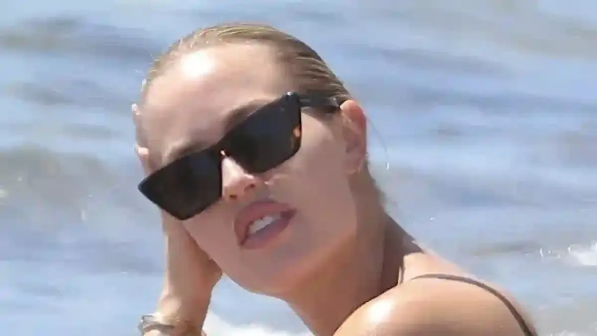 Lottie Tomlinson and Lewis Burton enjoy playful family beach day with children in Marbella