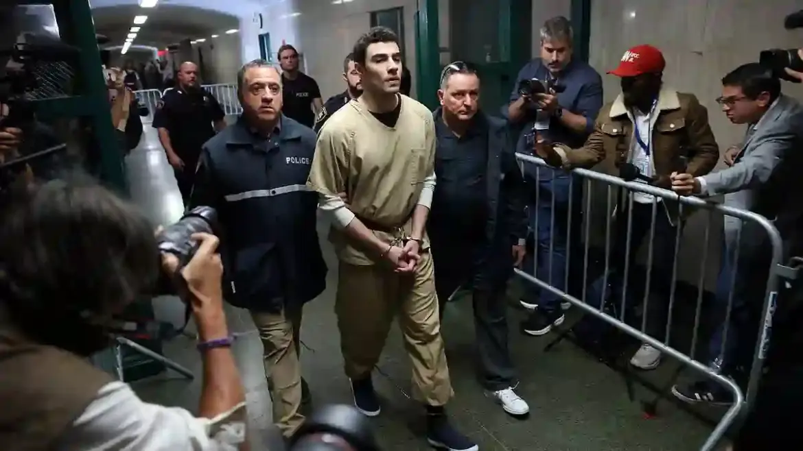 Judge in Manhattan dismisses terrorism related murder charges against Luigi Mangione as supporters cheer inside courtroom
