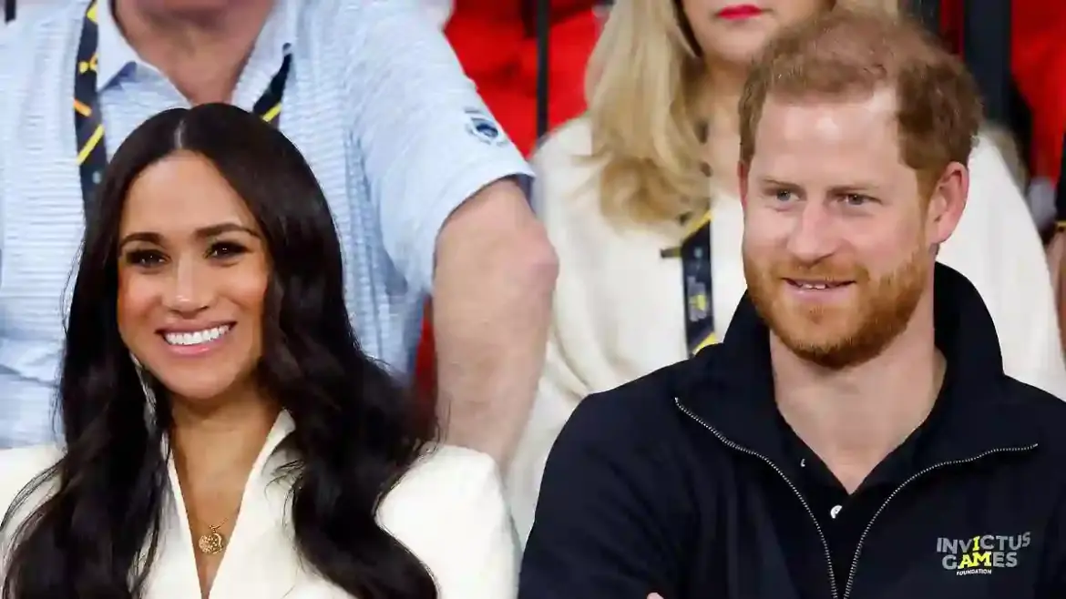Meghan Markle shows her support as Prince Harry enjoys a playful balloon sword fight with a young girl at the WellChild Awards in London after visiting Queen Elizabeth’s resting place in Windsor