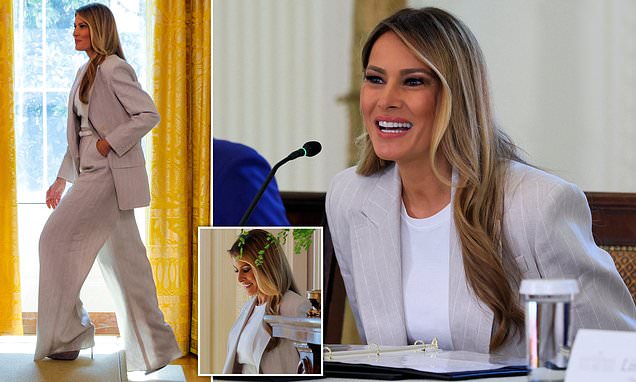 Melania Trump proves she is rewriting First Lady fashion history as she appears in a dramatic oversized power suit at the White House in Washington D.C.