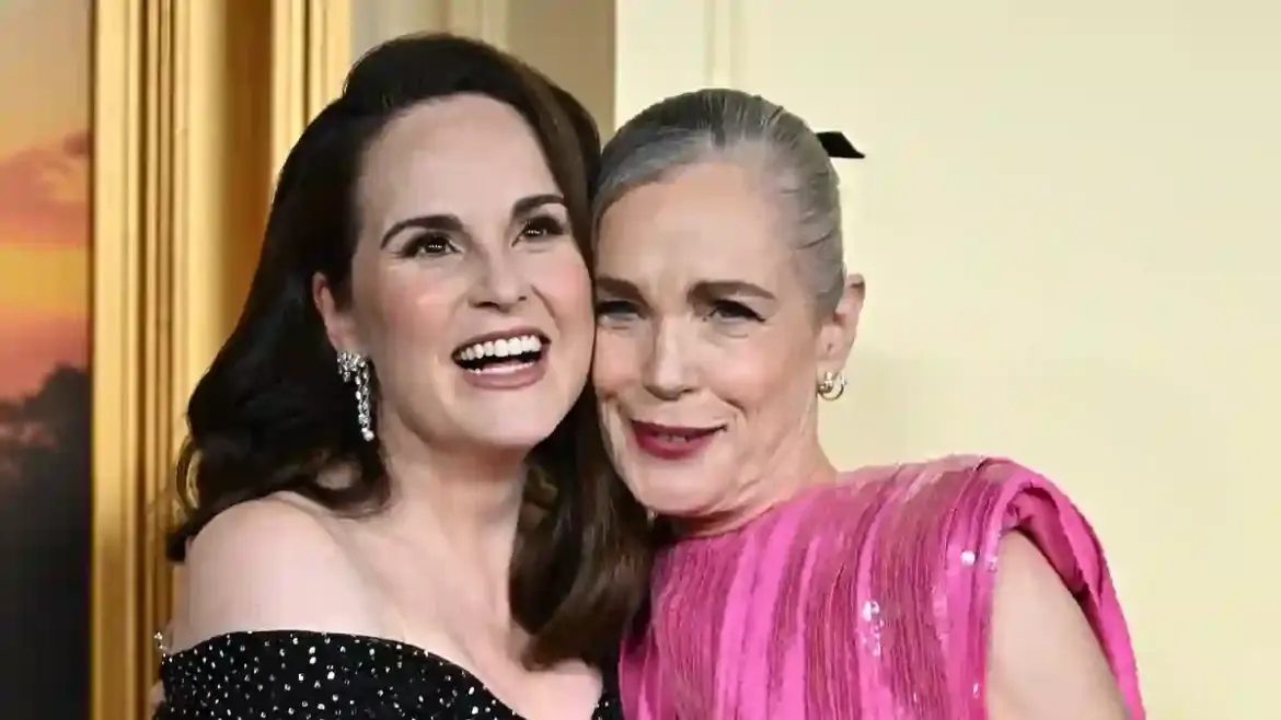 Michelle Dockery stuns fans with baby bump on New York red carpet at Downton Abbey final movie premiere
