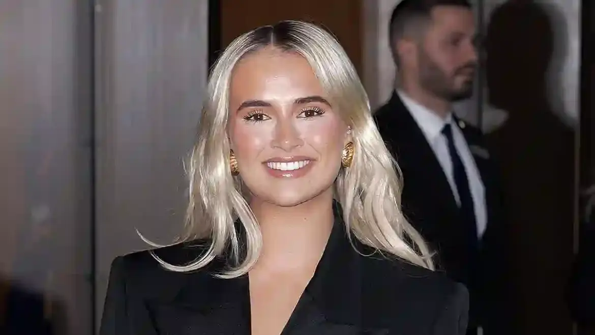 Molly Mae Hague joins Prince Harry at the WellChild Awards in London as the influencer showcases chic black suit style alongside royalty